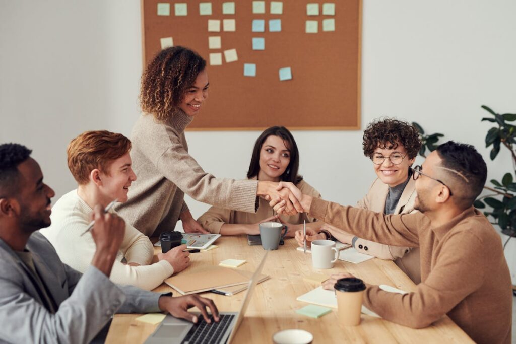 Charity team collaborating on IT strategy in a meeting room
