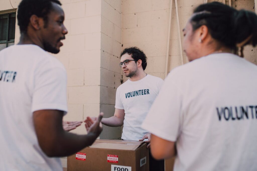 Charity volunteers organising community donations